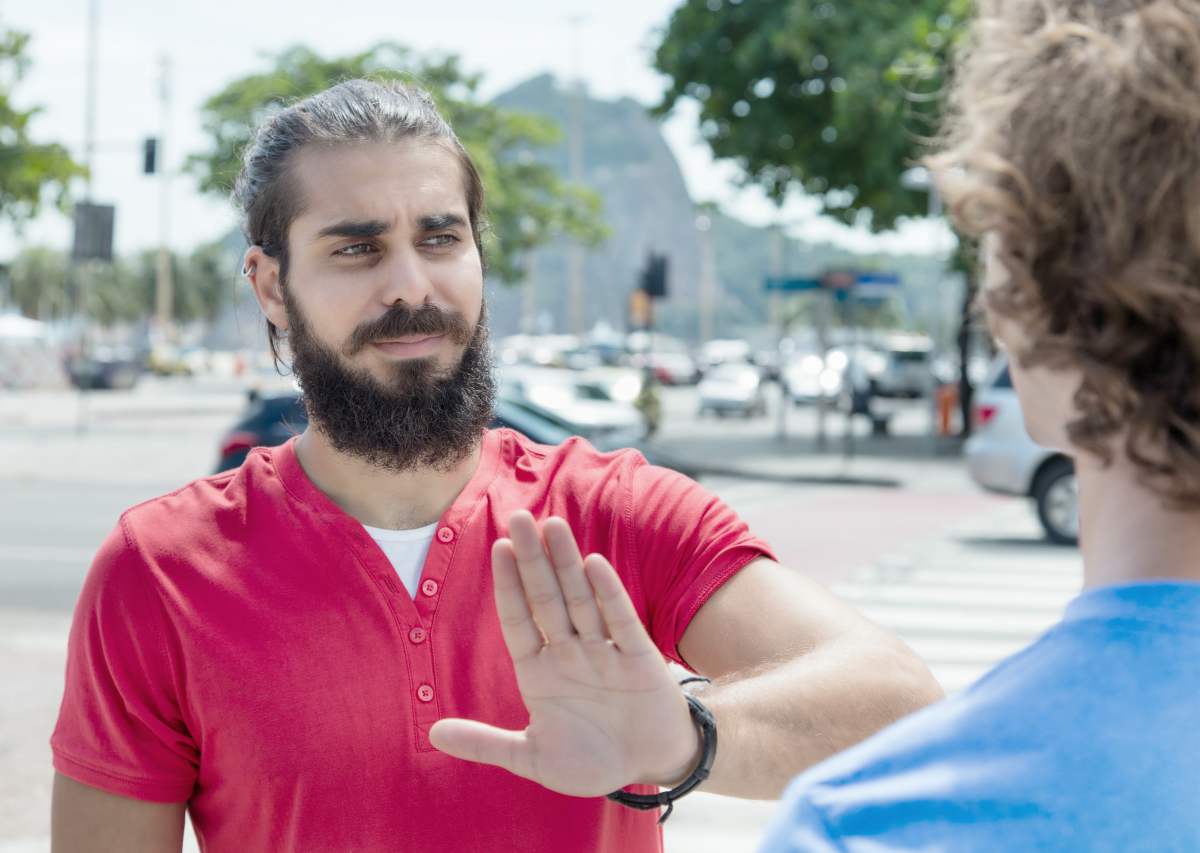 man saying no | Tips To Keep The Stress Away During Busy Summer Months | ways to relieve stress
